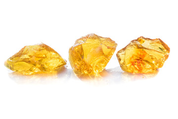Yellow resin obtained from the rubber of the tree.