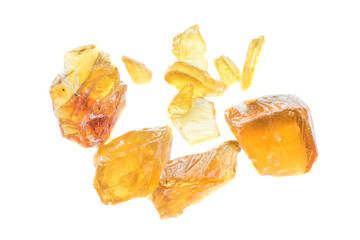 Yellow resin obtained from the rubber of the tree.