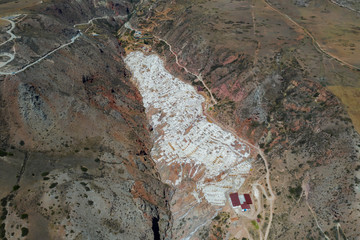 Aerial view of Salinas or Salineras de Maras. A salt mine in Andes mountain range, Peru