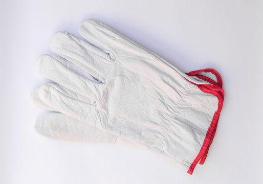 work leather gloves on a white background © Serhii Holdin
