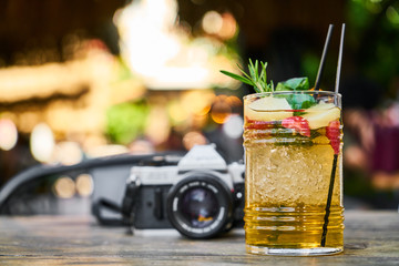 film camera and cool cocktail