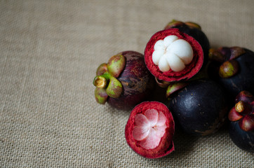 Mangosteens on a clothsacks background : Tropical fruits