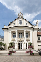 Fototapeta na wymiar Kurhaus of Meran is a famous building and a symbol of Merano town in South Tyrol in northern Italy