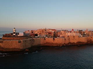 Fototapeta na wymiar Aerial picture of Acre old city and the walls viewed from the sea 