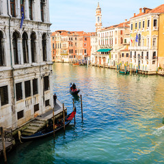  Gondolier rowing in his gondola in the Grand Canal of Venice © Victoria