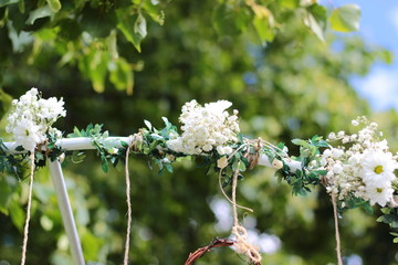Wedding decoration. Decoration of flowers on an arch for a wedding. Background, concept on a wedding theme.