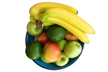 top view of pottery bowl filled with healthy organic fruits isolated on white