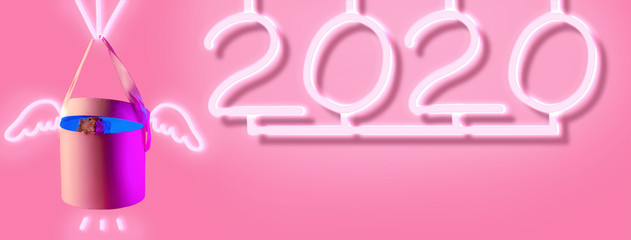 cute decorative rat in the gift and 2020 neon sign with shadow on pink background
