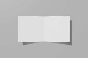 Mockup square booklet, brochure, invitation isolated on a grey background with hard cover and realistic shadow. 3D rendering.