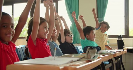 happy elementary school kids  in classroom