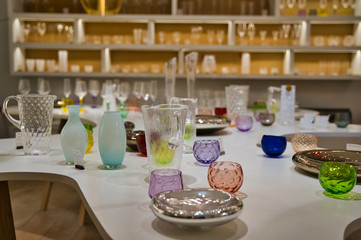 shelving shelves with different things of glass.