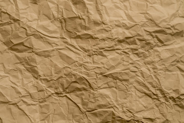Brown wrinkled paper. Waste recycling concept. Abstract art background. Copy space.
