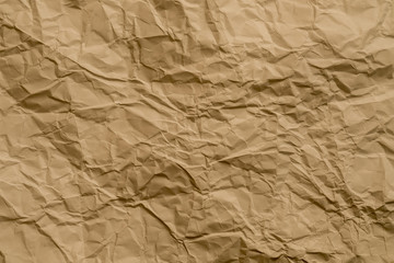 Brown wrinkled paper. Waste recycling concept. Abstract art background. Copy space.