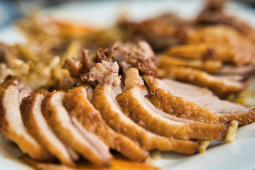 Close up of a barbecue Grill Pork in slices.