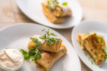 Sweet Stuffed Pancakes with a Sour Cream