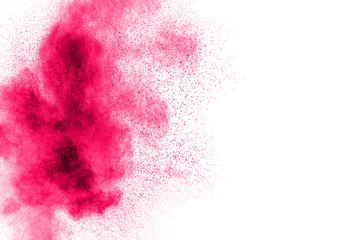 abstract pink dust explosion. abstract pink powder splattered on white background.