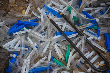 used syringes in the trash