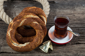Turkish Simit bagels on the wooden background for breakfast concept.