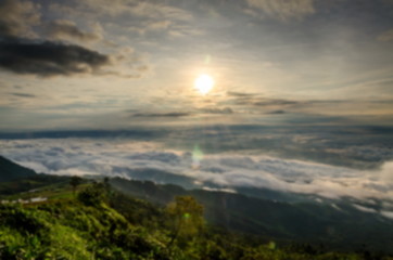 Picture blurred of beautiful landscape view point of sea of clouds on a hills at sunrise scene at phu tubberk , petchabun
