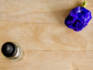 Asian pigeonwings (Clitoria ternatea) on the wooden table
