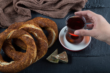 Turkish Simit bagels on the wooden background for breakfast concept.