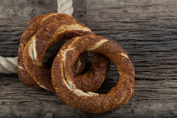 Turkish Simit bagels on the wooden background for breakfast concept.