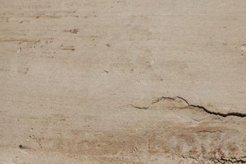 Wet sand texture in the sea shore beach - retro, vintage style look