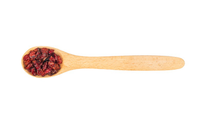 Dry barberry in spoon