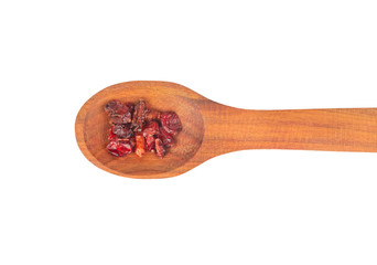 Dry barberry in spoon