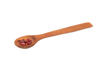 Dry barberry in spoon