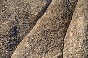 Brown cracked rock background texture