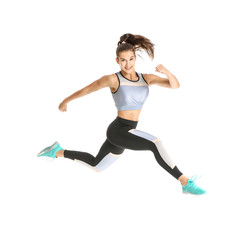 Fototapeta na wymiar Running sporty woman on white background