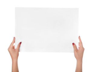 Female hands with empty sheet of paper on white background