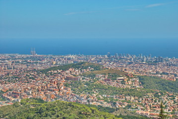 Amazing beautiful view from Mount Tibidabo to Barcelona and the Sea