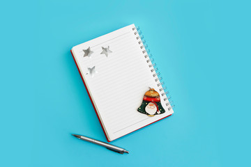 business notepad for spiral notes, stationery pen and christmas decor for new year holiday