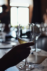glass of whitewine on table
