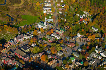 Aerial view of the town of Stowe Vermont on a colorful autumn afternoon