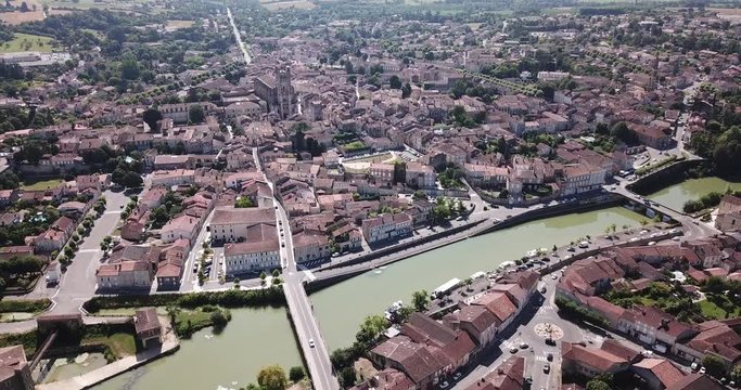 Panoramic aerial view of Condom city on Baise river on sunny summer day, Gers, France