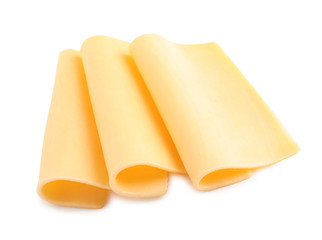 Slices of tasty cheese on white background