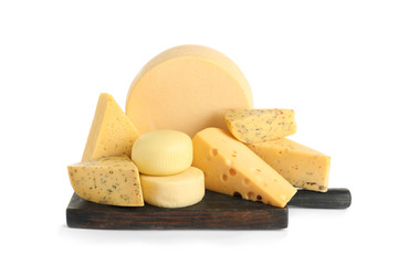 Wooden board with different kinds of cheese on white background