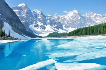 Wall murals Canada Moraine lake under the ice at morning spring time. Banff National park. Canada.