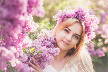 Girl blonde in lilac closeup