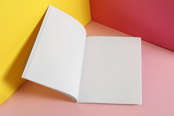 Empty book pages on color background. Mockup for design