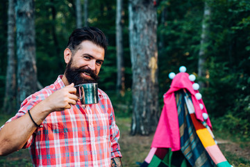 Go Ape Adventure. Camping and tent near beautiful sunlight in the morning. Camping in improvised...