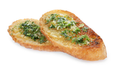 Slices of toasted bread with garlic and herb on white background
