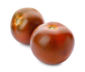 Fresh ripe brown tomatoes on white background