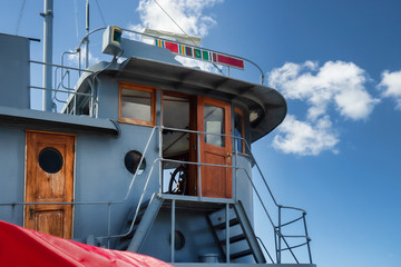 Wheelhouse of a vintage tugboat © debramillet
