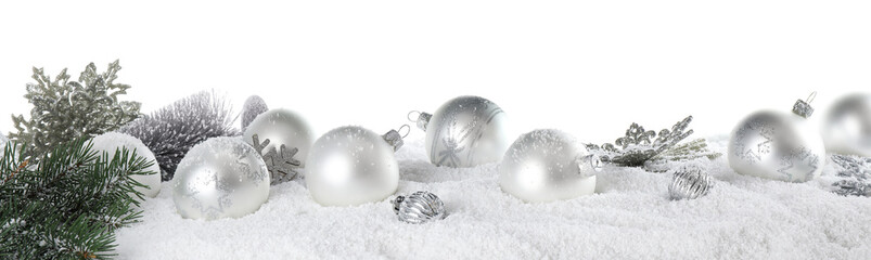 Christmas decoration on snow against white background