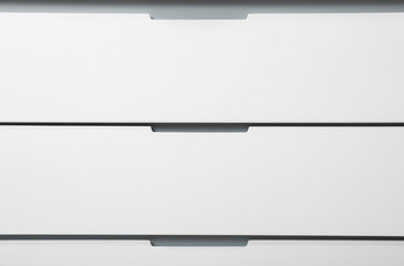 Modern white chest of drawers as background