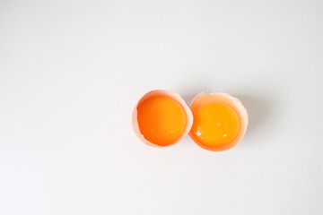 Fresh eggs from the farm placed on a white wooden table background